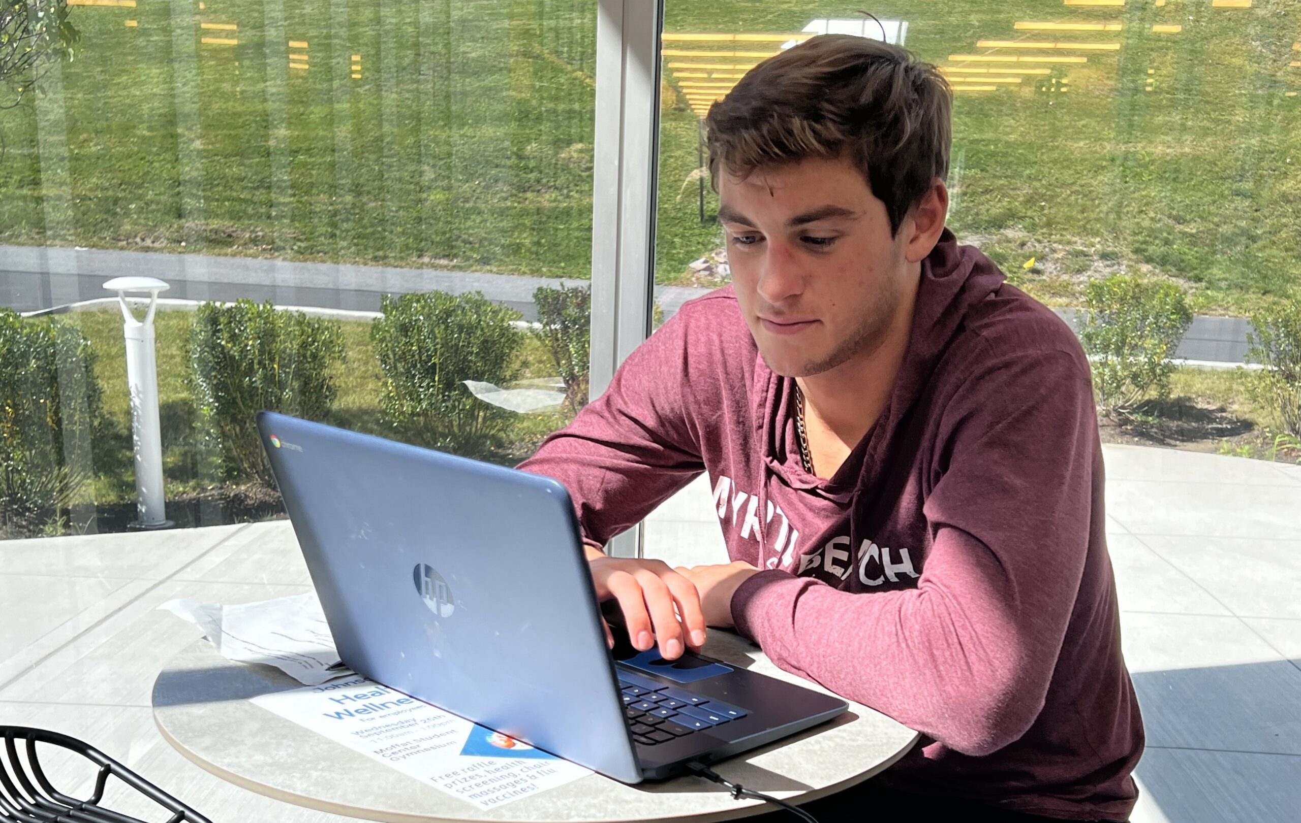 student working on computer